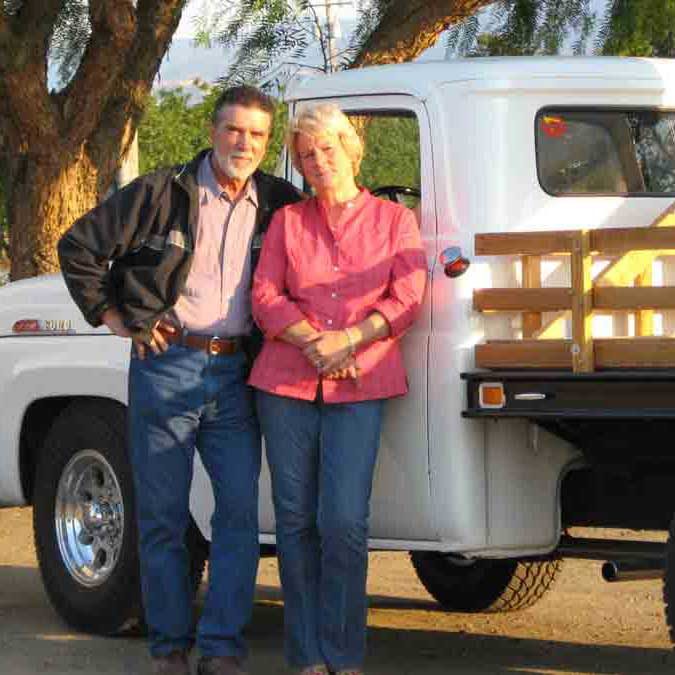 John Ivancovich and his wife with their truck